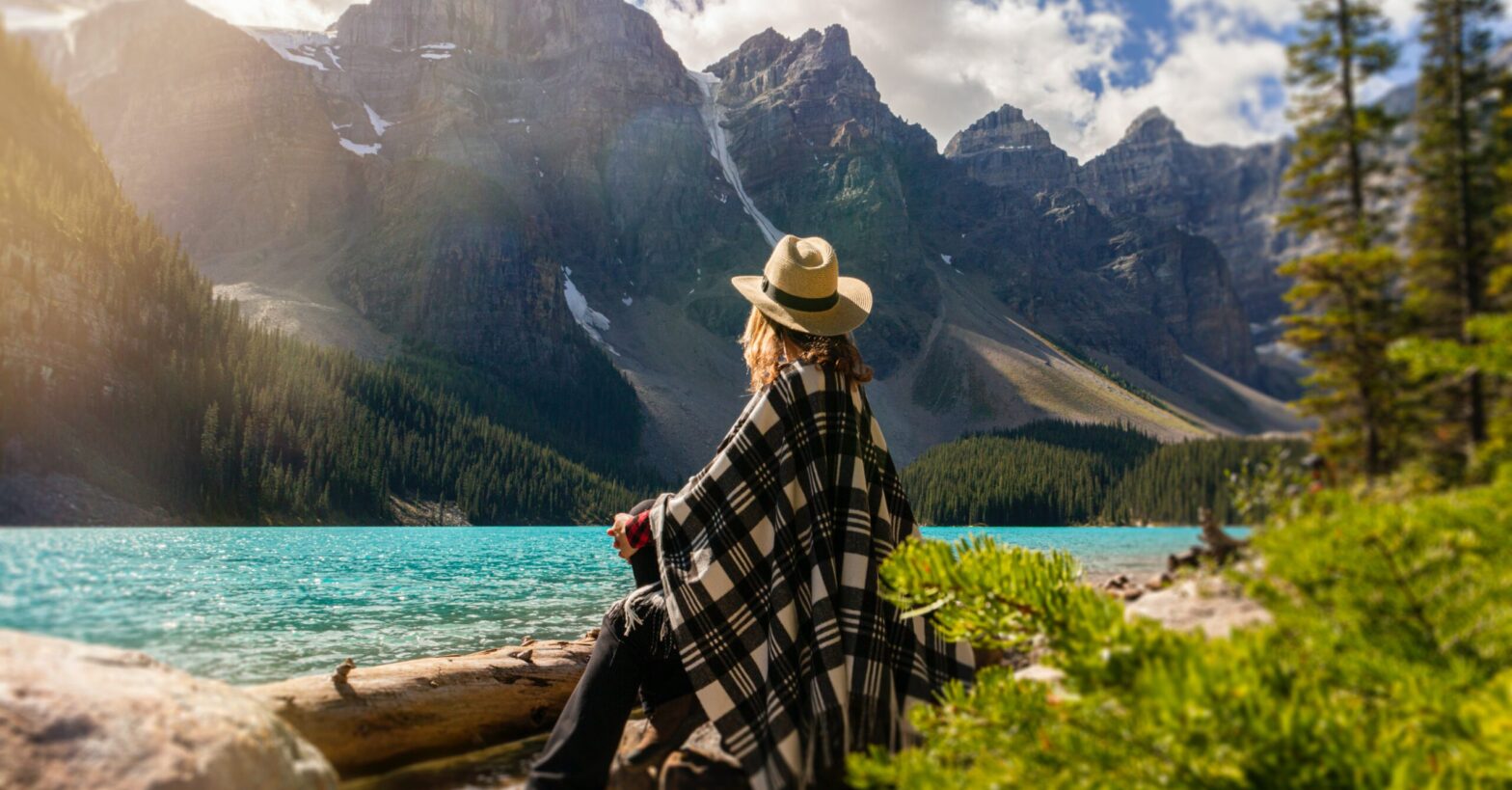 Woman watching mountains and enjoying the view